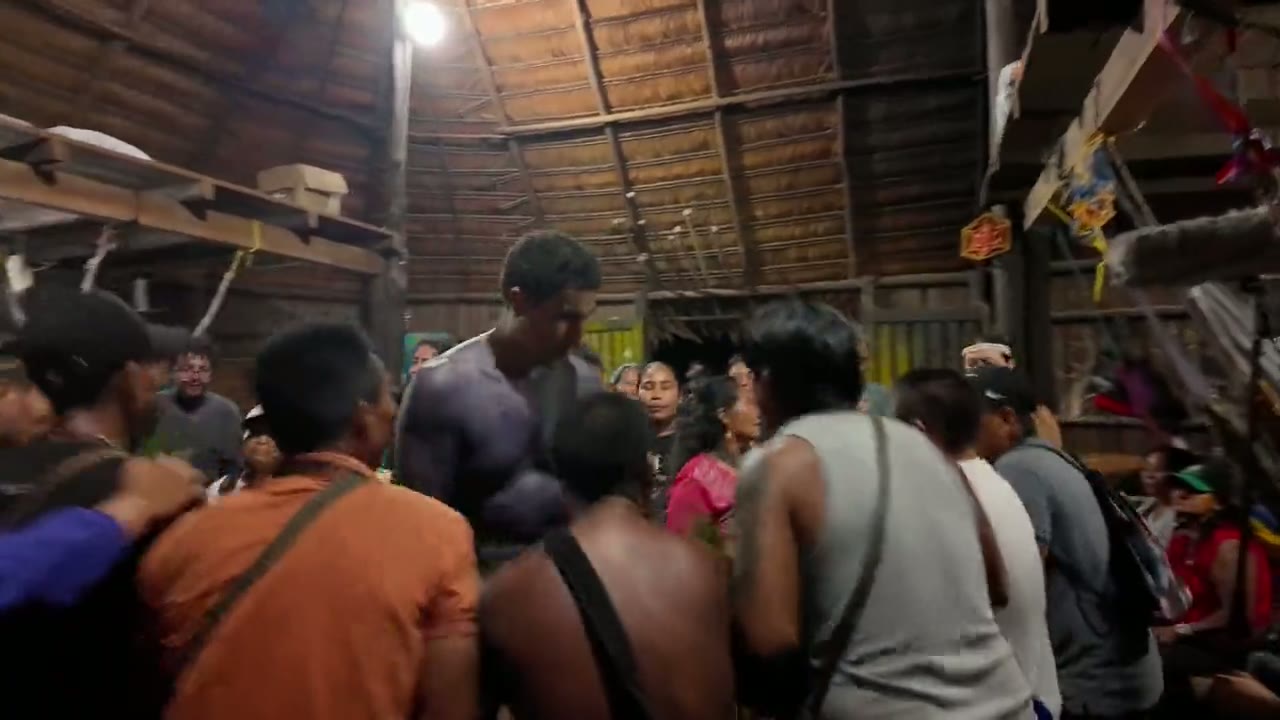 An evening of music and dance in the maloca
